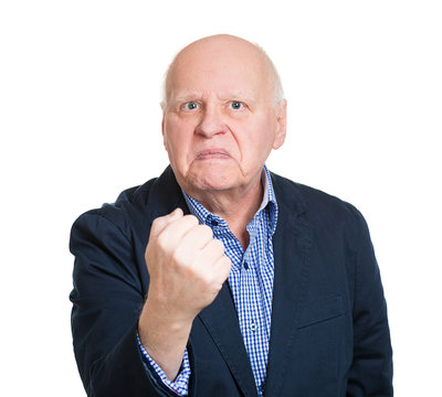 Portrait angry old man giving fist for you, white background 