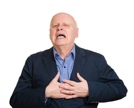 Senior man having chest pain, isolated white background 