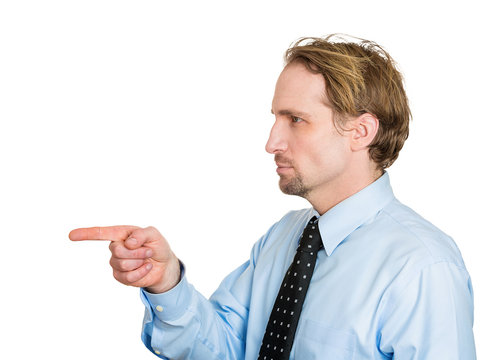 side profile portrait angry man pointing finger at someone 