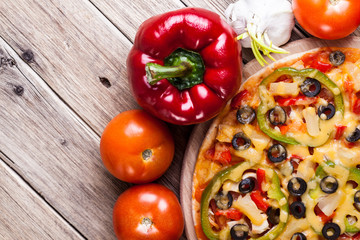 Delicious italian pizza served on wooden table