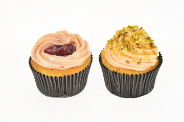 Colorful Mini Cup Cakes With Fruit Cream Topping, Side View