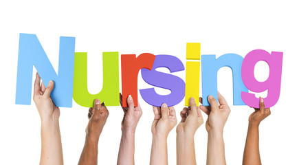 Fototapeta premium Multiethnic Group of Hands Holding Word Nursing