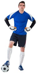 Fototapeta na wymiar Handsome goalkeeper in blue jersey