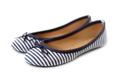 Women's striped shoes on white background