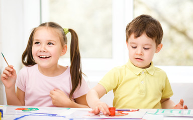 Fototapeta premium Children are painting with paint