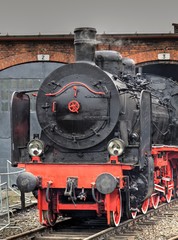 Naklejka premium vintage black steam powered railway train