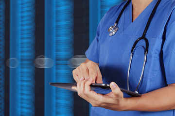 Doctor working on a digital tablet with digital background as co
