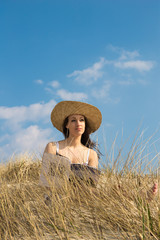 Obraz premium The girl with the hat