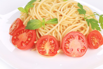 Italian pasta with tomatoes and basil.