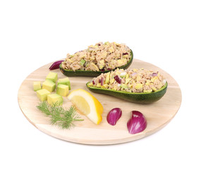 Avocado salad with tuna on platter.