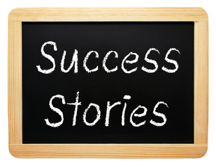 Fototapeta premium Success Stories - chalkboard on white background