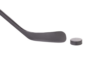 Black ice hockey stick and puck.