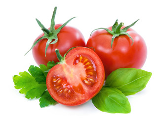 Ripe tomatoes with parsley and basil.