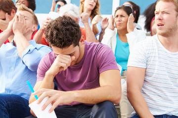 Disappointed Spectators At Outdoor Sports Event