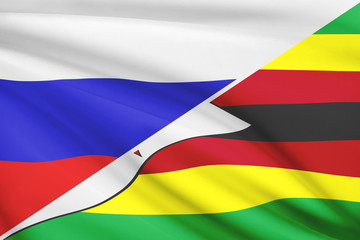 Series of ruffled flags. Russia and Republic of Zimbabwe.