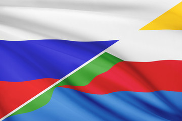 Obraz premium Series of ruffled flags. Russia and Union of the Comoros.