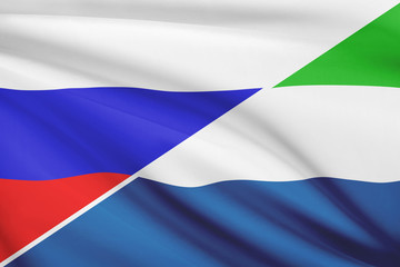 Series of ruffled flags. Russia and Republic of Sierra Leone.