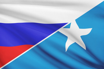 Series of ruffled flags. Russia and Federal Republic of Somalia.