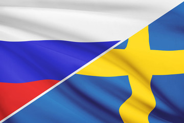 Series of ruffled flags. Russia and Kingdom of Sweden.