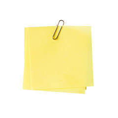 blank yellow note and clip on isolated white