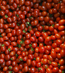 close up group of red tomatoes on ground use for beautiful backg