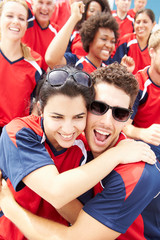 Sports Spectators In Team Colors Celebrating