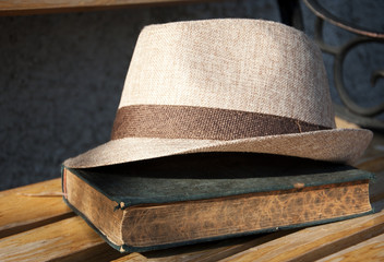 Hat on a old book