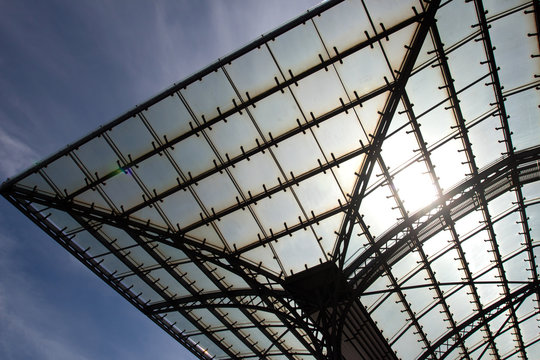 The glass roof of a station in sunlight