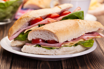 Panini sandwich with ham, cheese and tomato