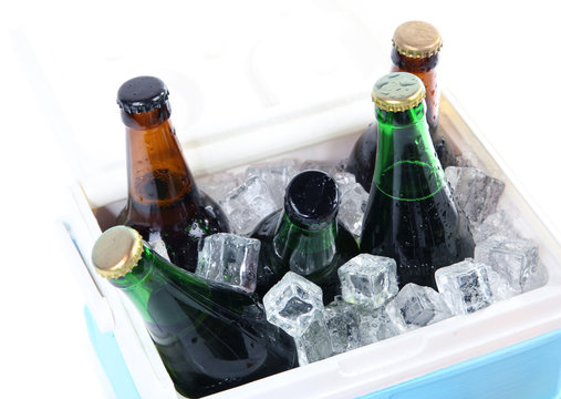 Ice chest full of drinks in bottles