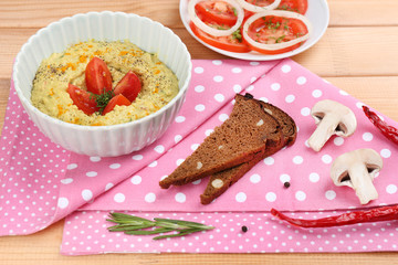 Bowl of tasty fresh hummus, close up