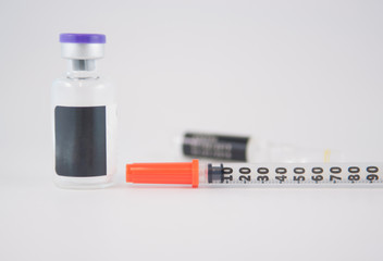 Disposable syringe and medicine injection vial background
