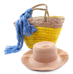 Wicker bag with hat and colorful scarf, isolated on white