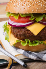 School lunch: fresh hamburger with meat and cheese