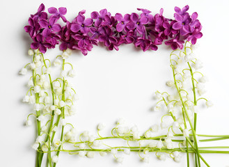 Beautiful lilac flowers and lilies of the valley, isolated