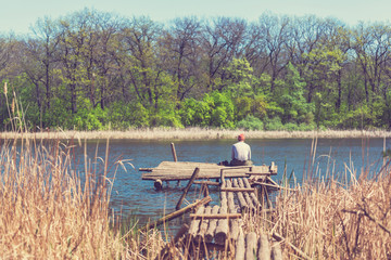 Fototapeta na wymiar Man on the lake