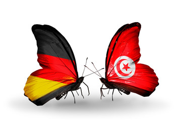 Two butterflies with flags  Germany and Tunisia
