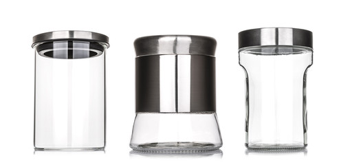 Empty glass jar with aluminum lid isolated on white background