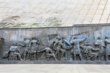 Wall of the monument with bas-relief
