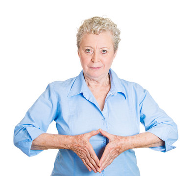 Senior woman with hand leader gesture on white background 