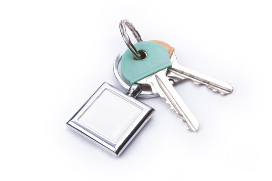 A bunch of keys with a key ring, isolated on a white background