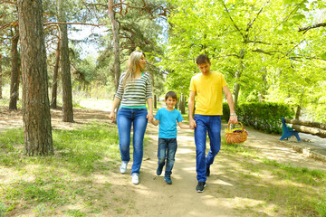 Fototapeta premium Happy family, walk in the park