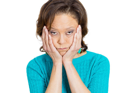 Headshot Depressed Senior Woman On White Background 