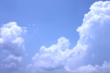 White clouds on a blue sky.