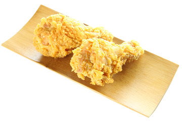 fried chicken in bamboo dish of isolated.