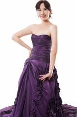 Fototapeta premium beautiful woman model posing in elegant dress posing