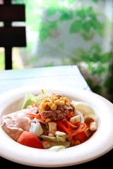 tuna and vegetable salad in dish.