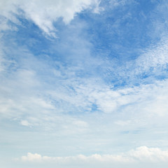 Naklejka na ściany i meble The white cumulus clouds against the blue sky
