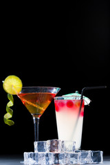 Cocktail with whisky and raspberry sphere