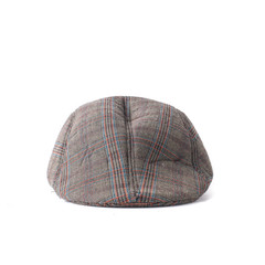 Flat cap in grey and brown tweed isolated on white background